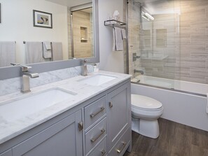 Bathtub, hair dryer, towels