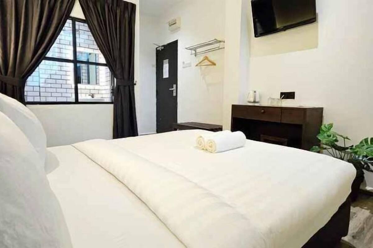 Desk, laptop workspace, free WiFi, bed sheets