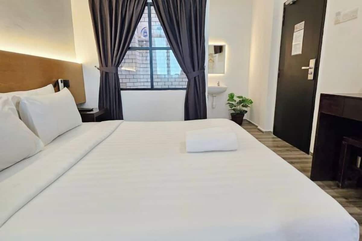Desk, laptop workspace, free WiFi, bed sheets