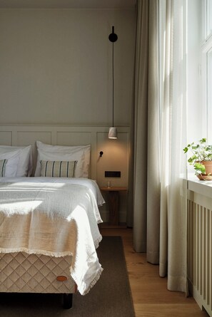 Ropa de cama de alta calidad y camas con pillow-top 