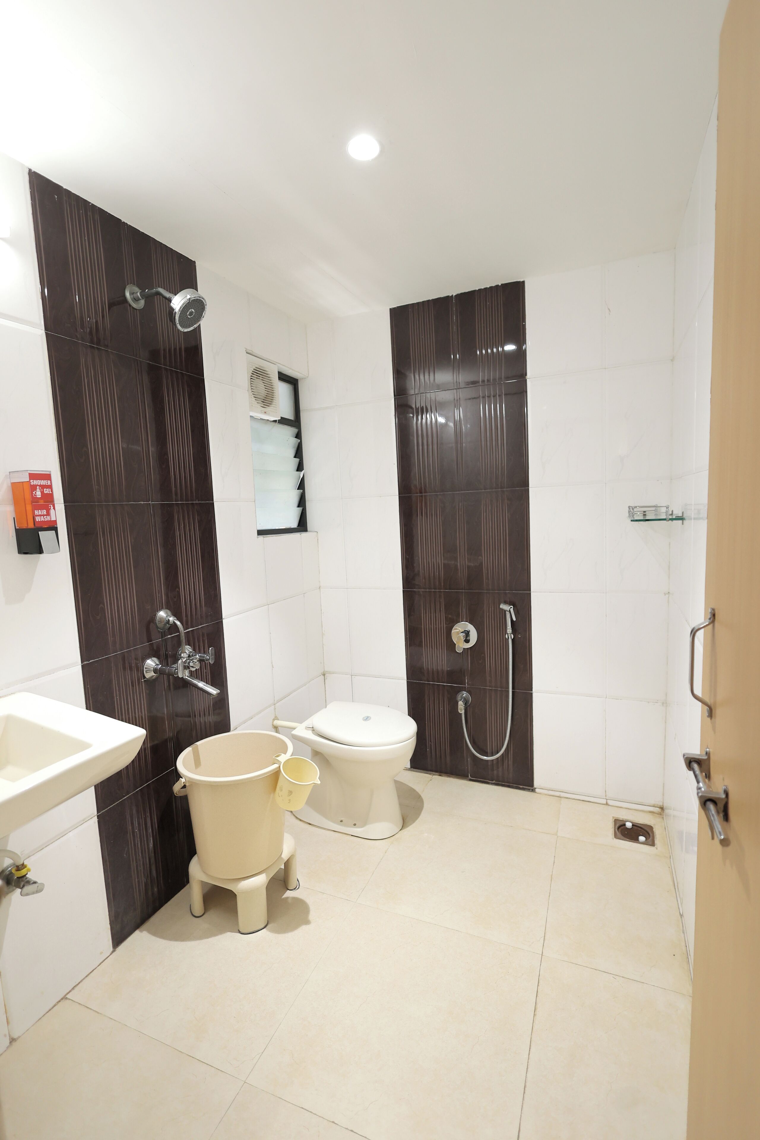 superior room, city view | bathroom | shower, rainfall showerhead, towels