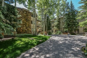 Stroll through the serene courtyard, surrounded by lush greenery and a blend of traditional and modern architecture.