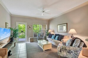 Condo, 2 Bedrooms | Living area | Flat-screen TV - Shorenugh - Bright Villa with Rooftop Pool Next to Coligny Plaza by RedAwning (Hilton Head Island)