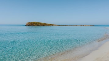 Beach nearby, white sand, 3 beach bars