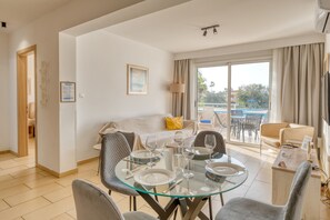 Superior Apartment, 1 Bedroom, Pool View | Living area | 43-inch Smart TV with satellite channels, TV - Narcissos 'Nissi Beach' apartment C3 (Ayia Napa)