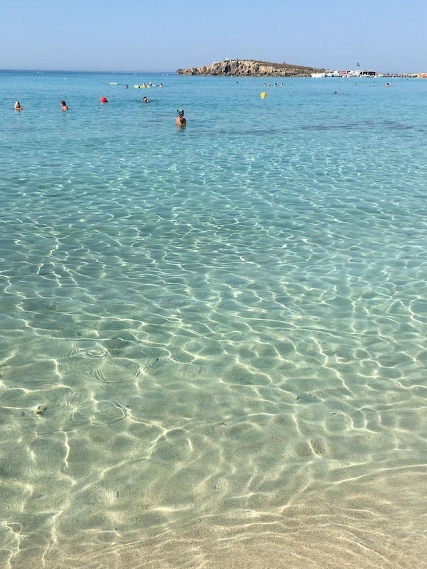 Beach nearby, white sand, 3 beach bars
