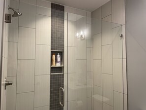 Combined shower/tub, hair dryer, towels, soap