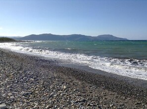 On the beach, sun loungers
