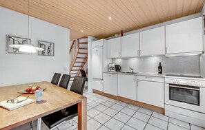 Fridge, stovetop, dishwasher, coffee/tea maker