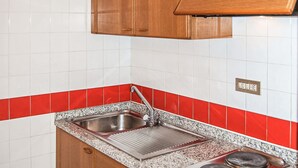 Fridge, microwave, stovetop, cookware/dishes/utensils