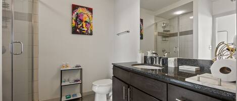 Combined shower/bathtub, hair dryer, towels, soap