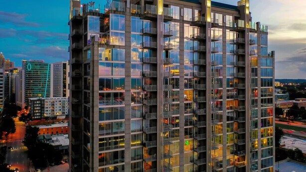 A high-rise building with multiple balconies and large windows. - The Urban Oasis in Midtown (Atlanta)