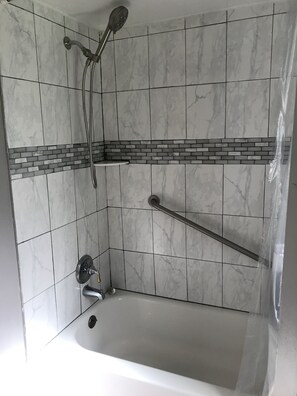 Combined shower/bathtub