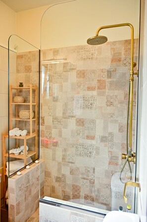 Shower, hair dryer, towels, soap
