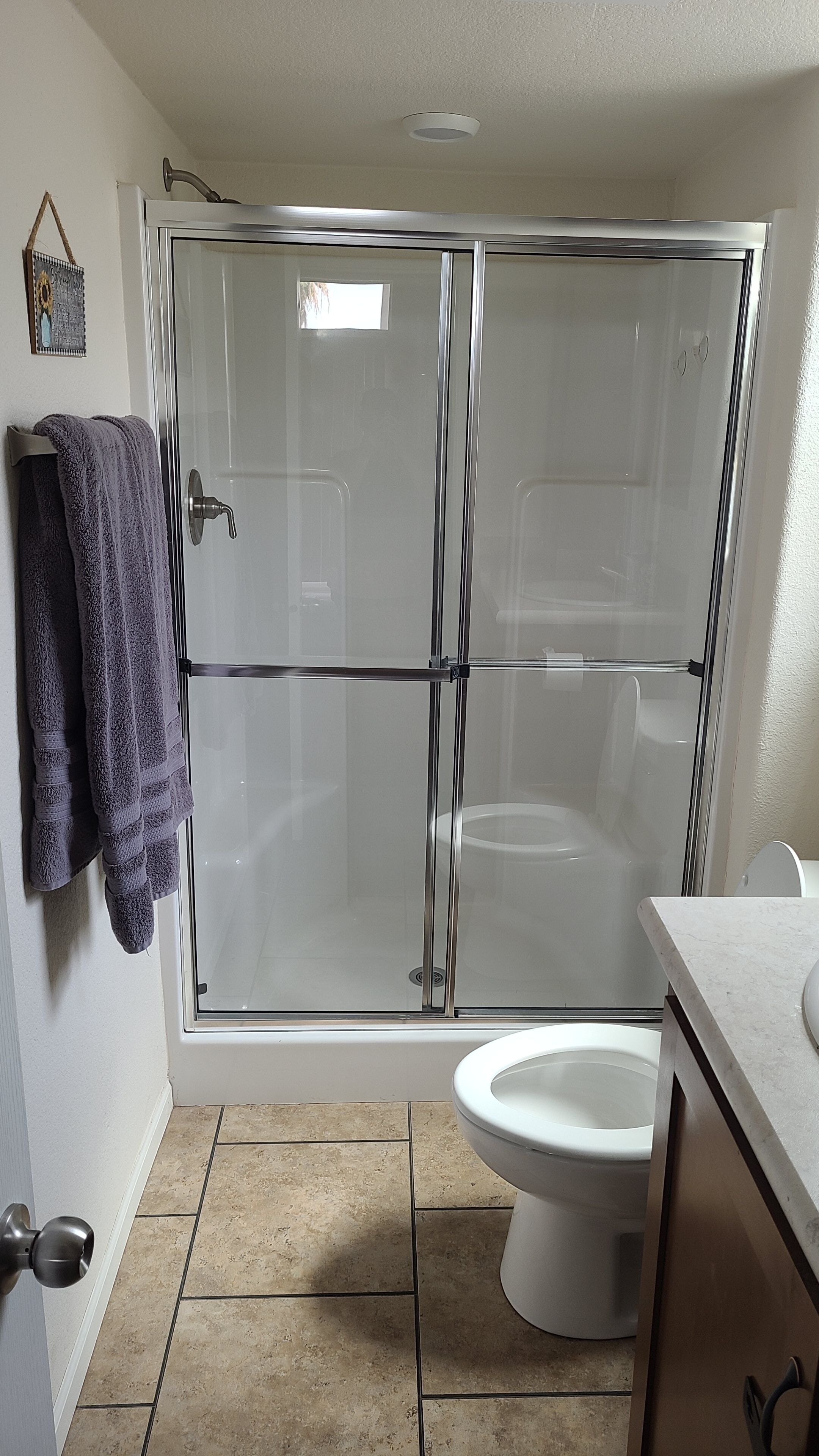 Shower, towels, soap, toilet paper