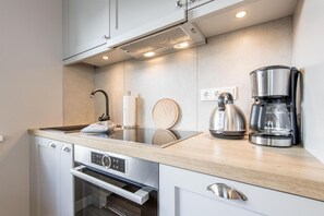 Réfrigérateur, four, plaque de cuisson, lave-vaisselle