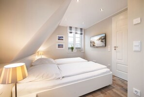 2 bedrooms, in-room safe, iron/ironing board, WiFi - House Steinmannstraße 77, half of the house A (Sylt)