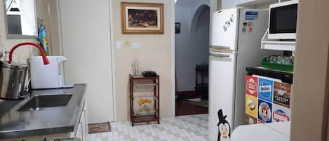 Fridge, microwave, stovetop, cookware/dishes/utensils