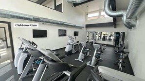 A gym with treadmills, stationary bikes, and weight machines. - 40 Mins to Glacier Park, 5 Mins to City Beach & DT (Whitefish)