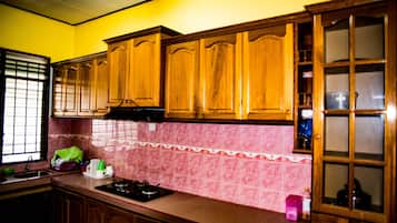 Fridge, microwave, electric kettle, dining tables