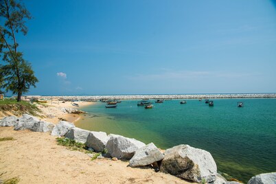 The house is a semi-detached house with plenty of parking ,and near to the beach