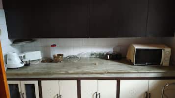 Fridge, microwave, toaster, cookware/dishes/utensils