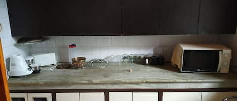 Fridge, microwave, toaster, cookware/dishes/utensils