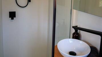 Shower, towels, soap, shampoo