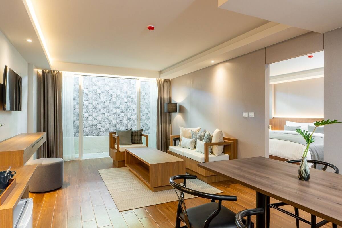 Suite | Luxe beddengoed, pillowtop-bedden, een minibar, een kluis op de kamer