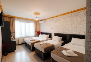 Standard Quadruple Room | Premium bedding, minibar, individually furnished, laptop workspace - Golden Horn Park Hotel (Istanbul)