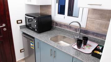 Departamento, 1 habitación, para fumadores, patio | Cocina privada