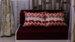 A room with a bed, curtains, and a patterned wall. - Perfect Place for 2 or 3 (Petrich)