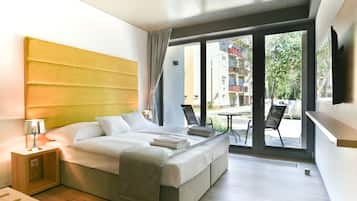 Quarto casal conforto | 1 quarto, berço de viagem, Wi-Fi de cortesia, roupa de cama