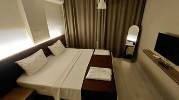 Dobbelt- eller tomannsrom – økonomi | Minibar, strykejern/-brett og wi-fi (inkludert)