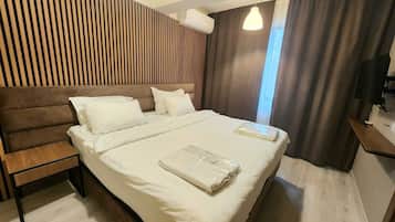 Habitación doble estándar | Minibar, tabla de planchar con plancha y wifi gratis