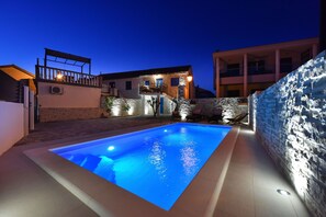Enjoy a refreshing swim in the pool from the comfort of your balcony.