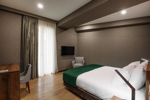 Kamar Deluks | Seprai premium, bantalan ekstra lembut, minibar, dan brankas