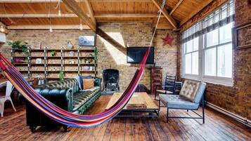 TV, fireplace, table football, books