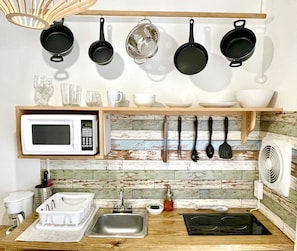 Fridge, microwave, stovetop, coffee/tea maker