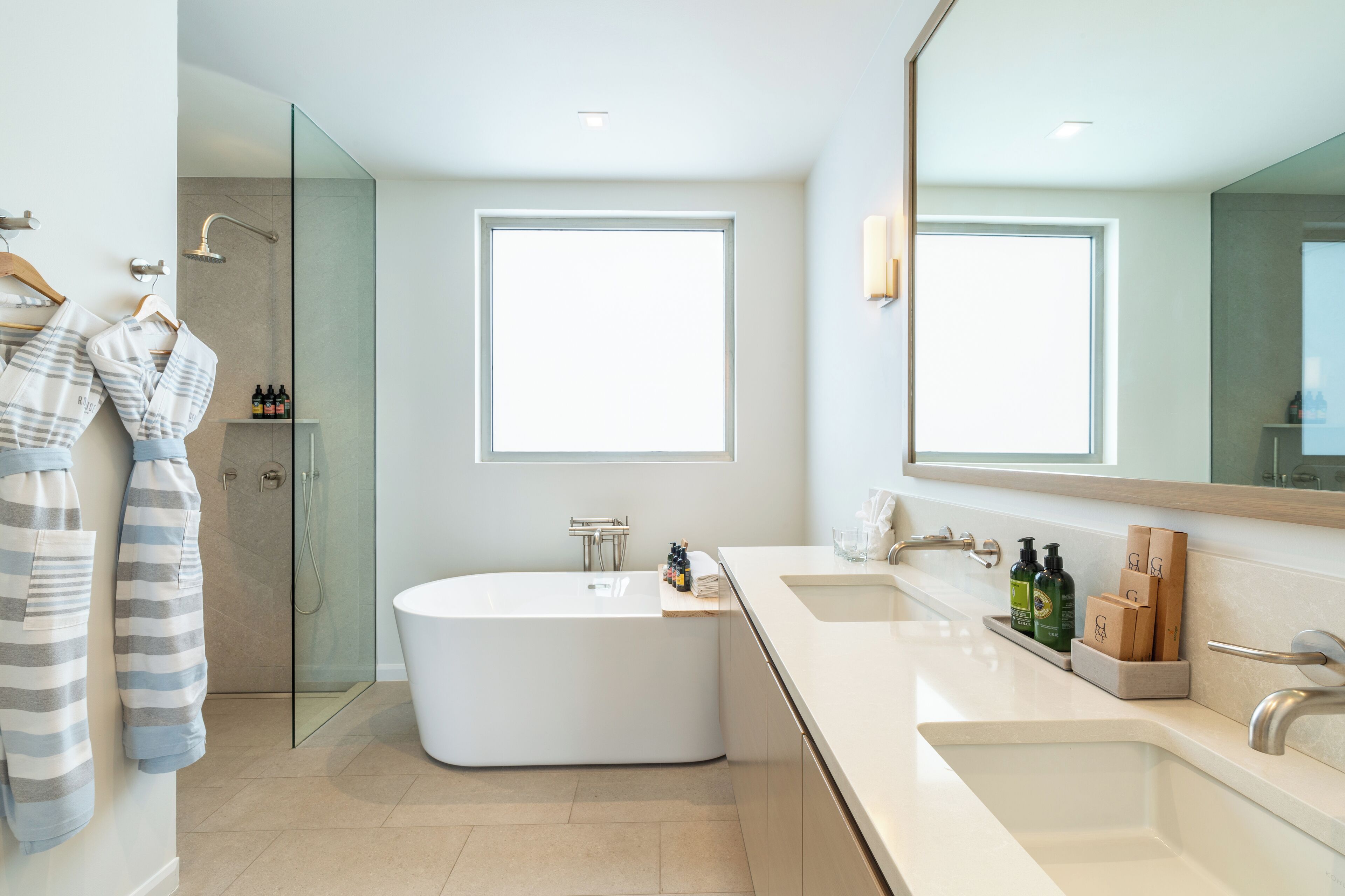 ocean view three bedroom reserve villa | bathroom | rainfall showerhead, free toiletries, hair dryer, bathrobes