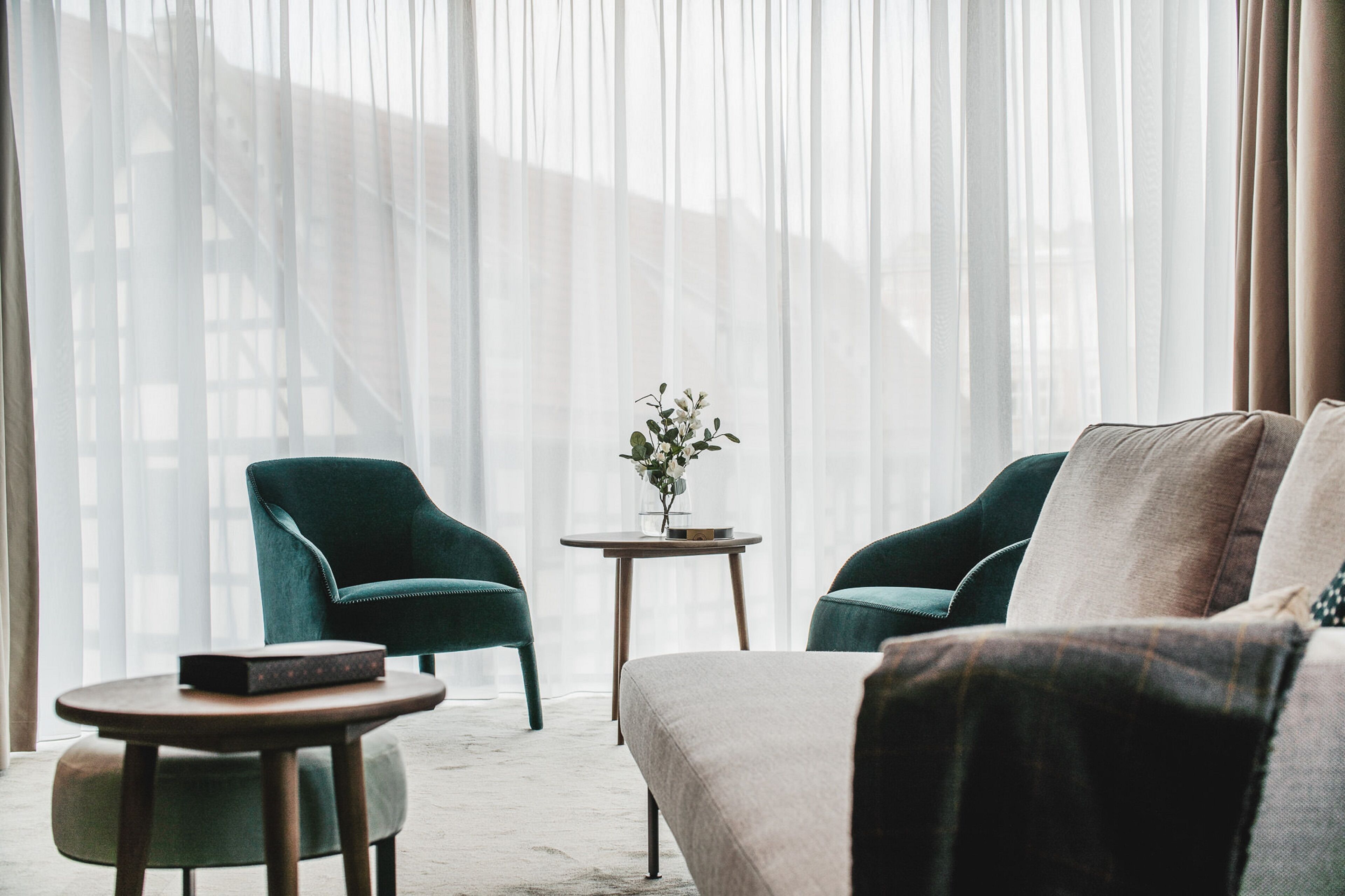 grand apartment | living area | flat-screen tv