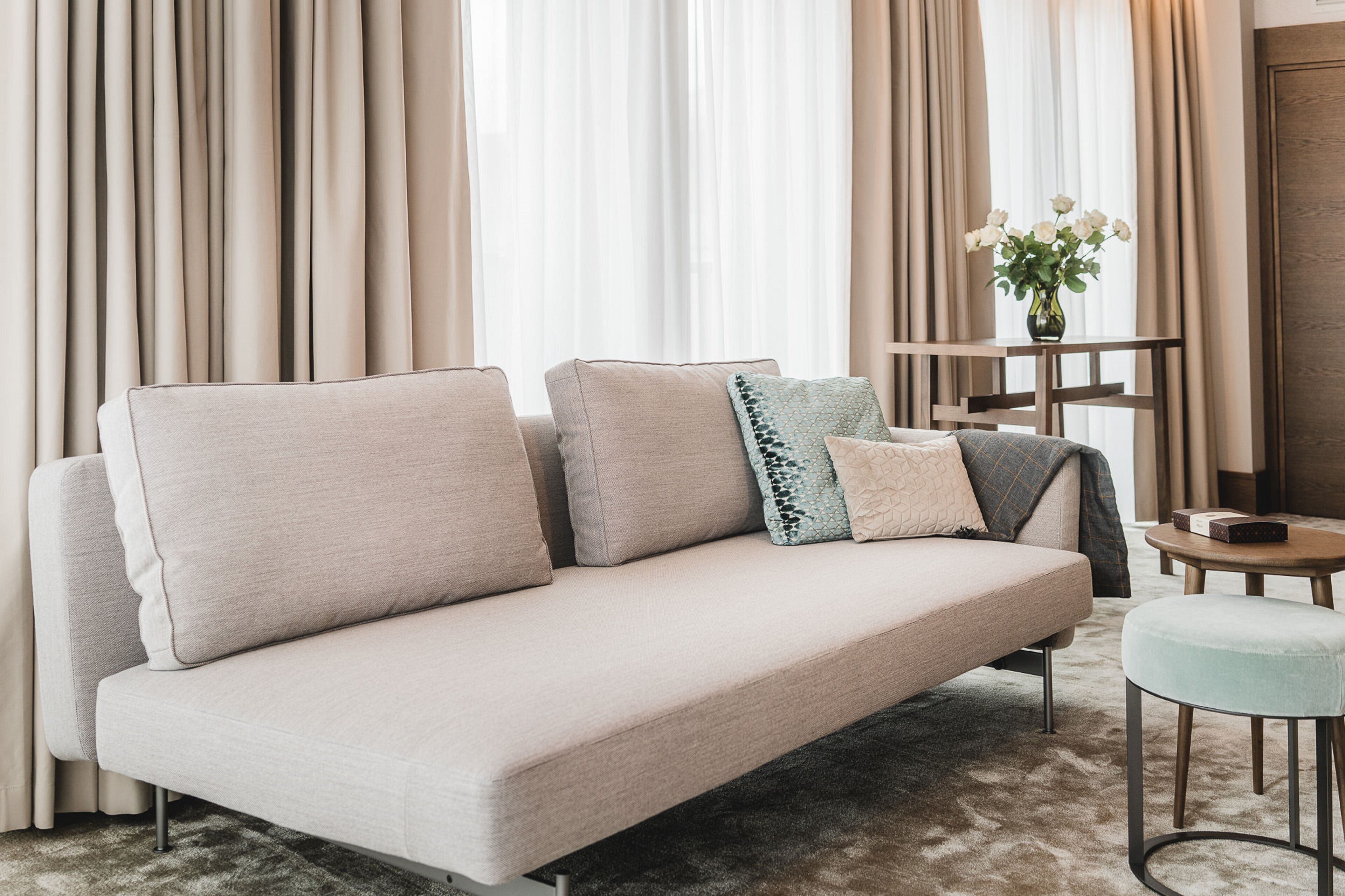 grand apartment | living area | flat-screen tv