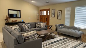 Smart TV, fireplace, foosball, books
