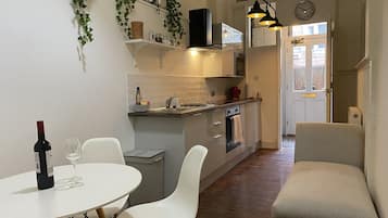 Fridge, microwave, oven, cookware/dishes/utensils