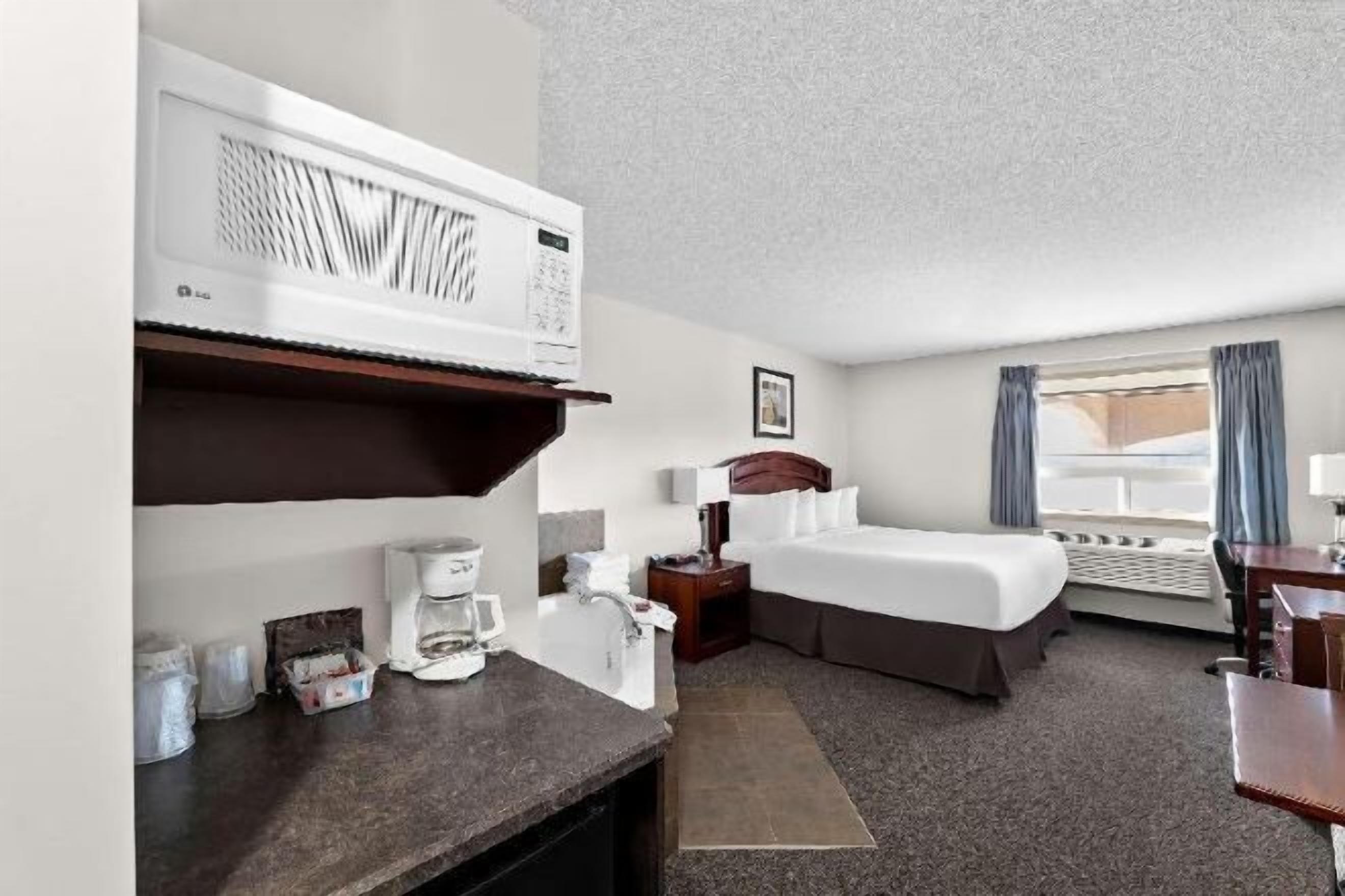 Individually furnished, desk, laptop workspace, blackout curtains