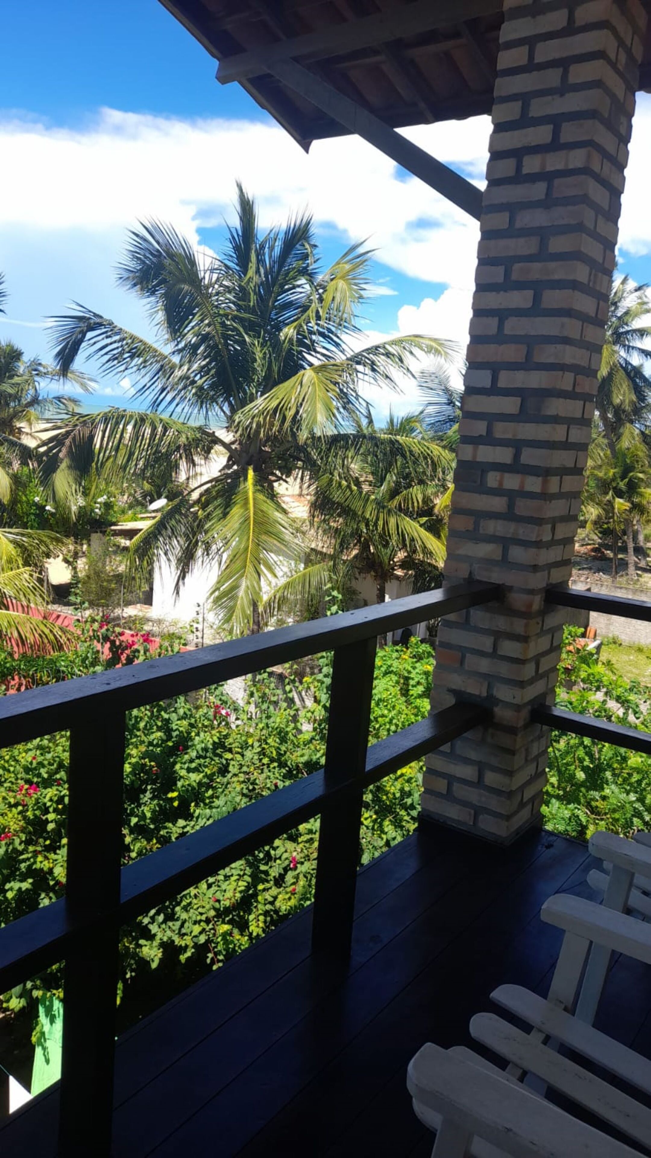 Quarto casal superior, vista para o mar | Frigobar, Wi-Fi de cortesia, roupa de cama