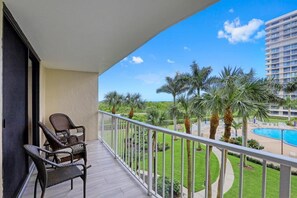 Condo, 1 King Bed with Sofa bed (Beachfront condo with heated pool, gy) | Balcony