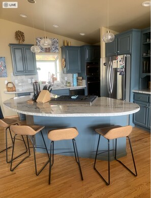 Fridge, microwave, dishwasher, dining tables