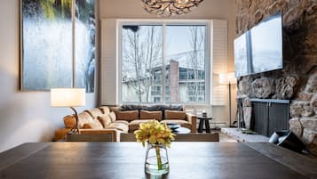 Luxury Condo | Living area | Flat-screen TV, fireplace
