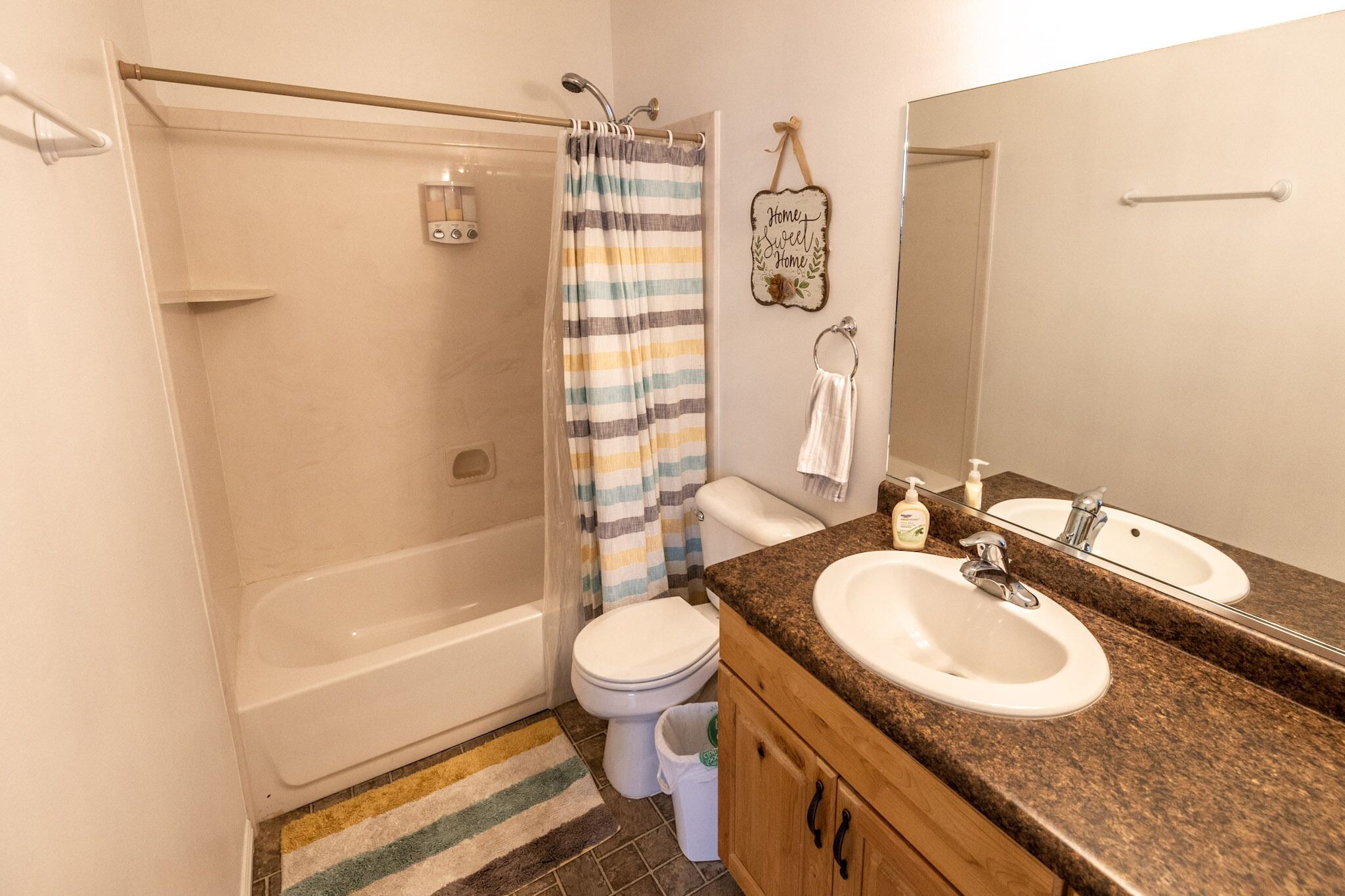 Combined shower/bathtub, hair dryer, towels, soap